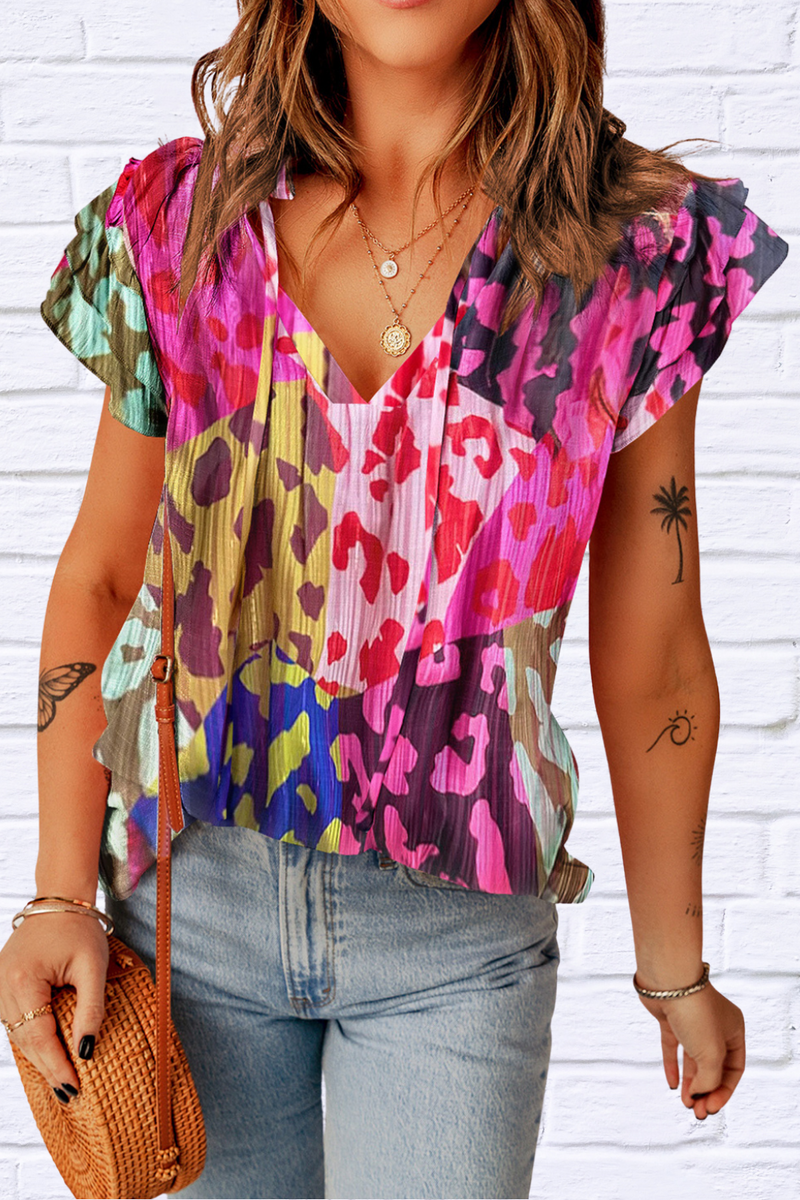 Ruffled Printed Tie Neck Cap Sleeve Blouse