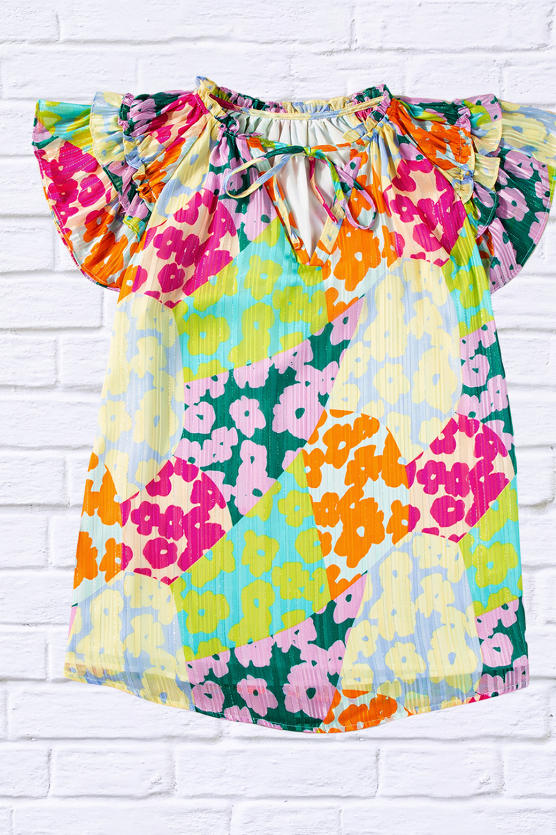 Ruffled Printed Tie Neck Cap Sleeve Blouse